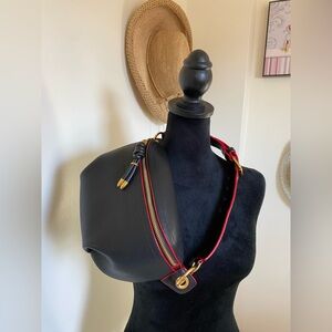 Sleek Black Shoulder Bag with Red Trim and Gold Accents Small Bag